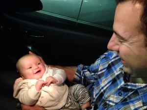 Smiles at dad during our drive through Ohio